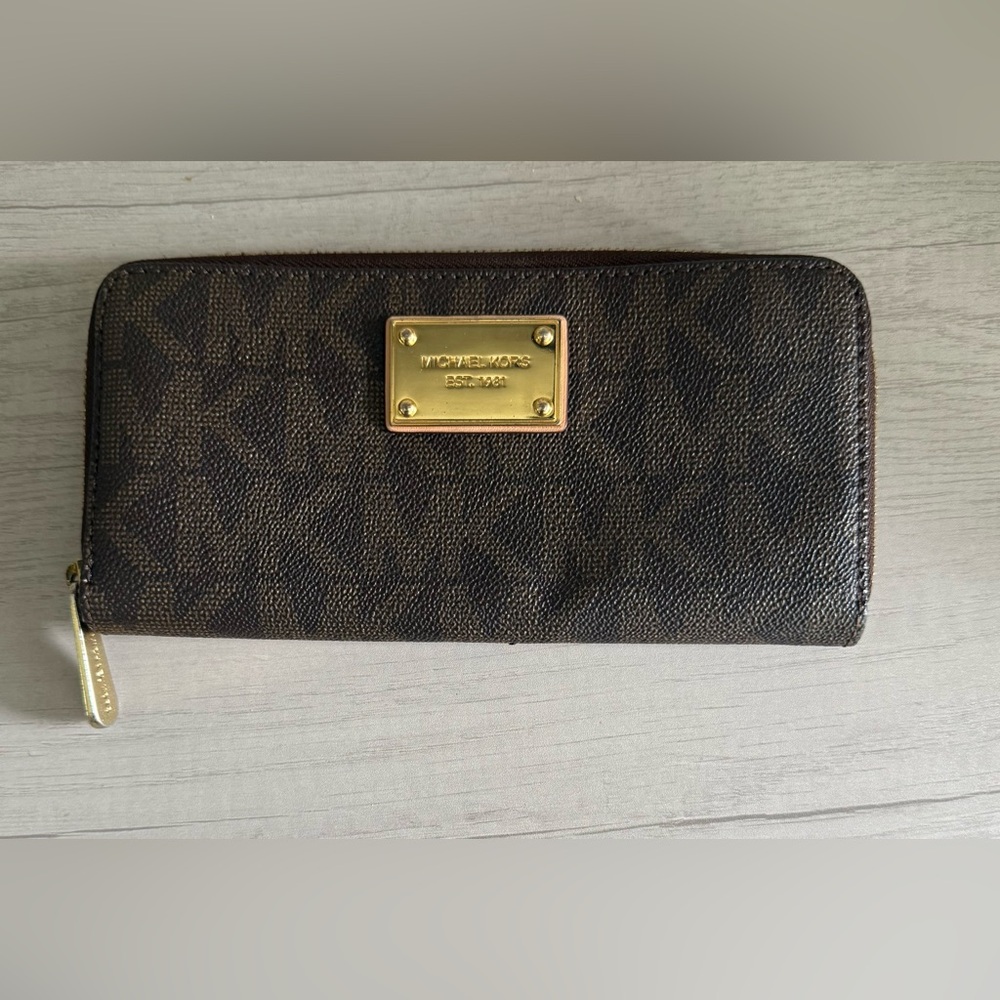 Michael Kors Jet Set Travel Continental Wallet in a brown signature logo pattern
